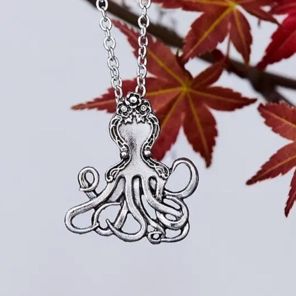 Octopus charm necklace; color Silver. 18” , 2” extender. Charm 1”x 1.15”. NIP
